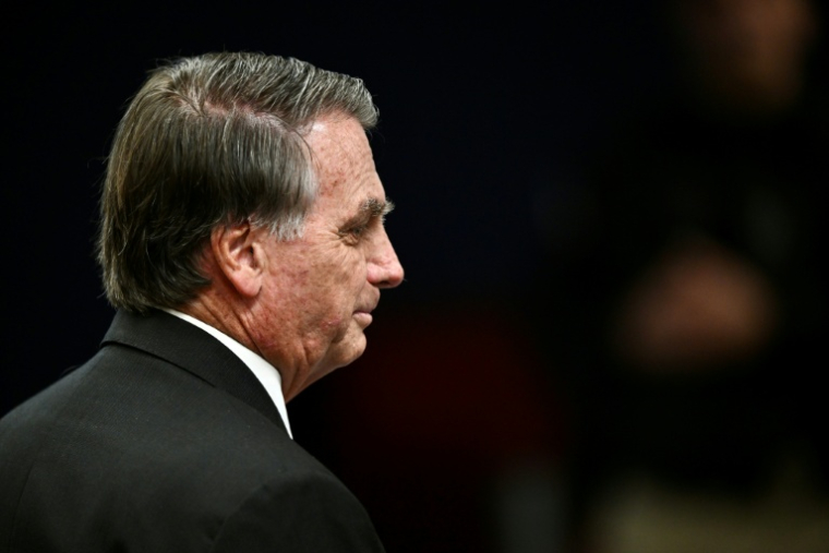 L'ancien président brésilien d'extrême droite Jair Bolsonaro sourit lors d'une audience de la Cour suprême, le 9 juin 2025 à Brasilia ( AFP / EVARISTO SA )