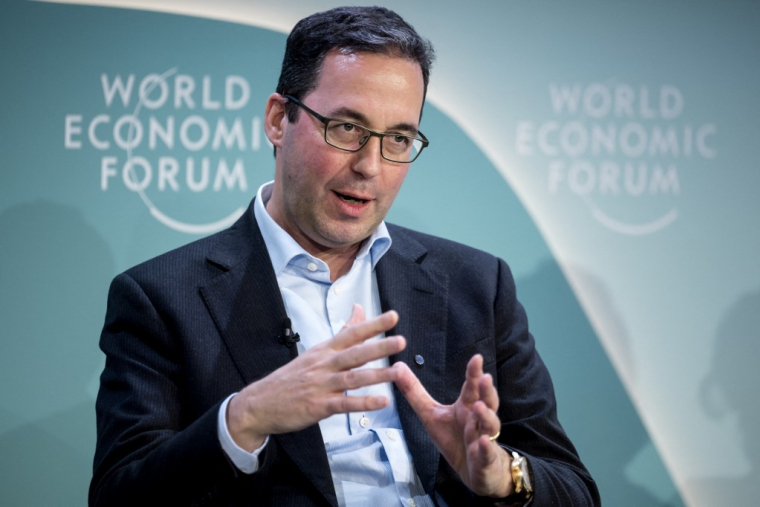 Christian Mumenthaler, PDG de Swiss Re, en janvier 2024 ( AFP / FABRICE COFFRINI )