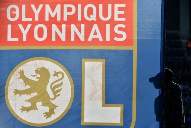 L'Olympique Lyonnais est rétrogradé en L2, après 36 saisons dans l'élite ( AFP / Rémy GABALDA )