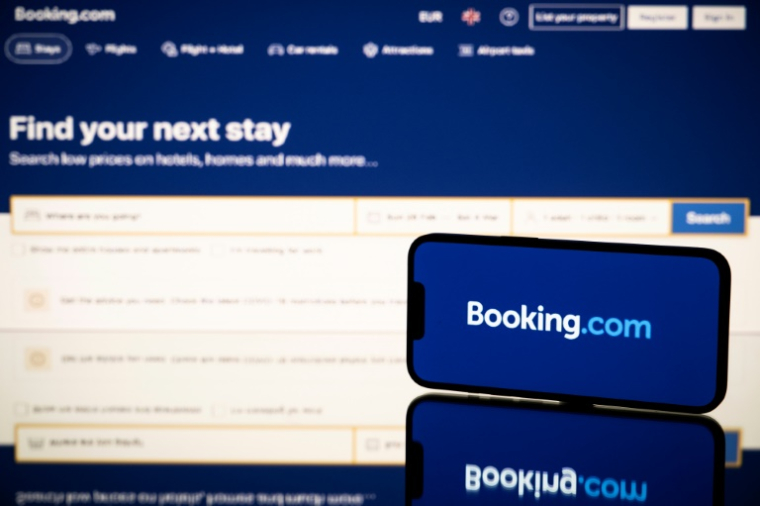 La plateforme de réservation en ligne Booking a été épinglée en France pour "pratiques restrictives de concurrence" envers les hôteliers français par la répression des fraudes (DGCCRF) ( AFP / Lionel BONAVENTURE )